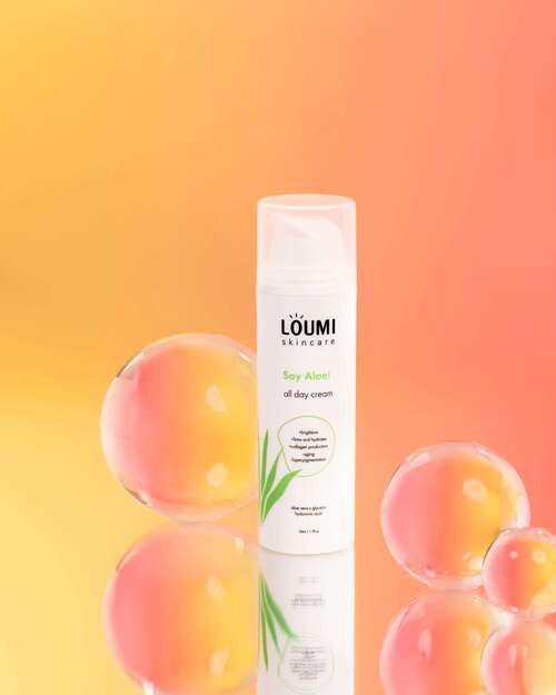 A bottle of Aloe Vera Face Cream from LOUMI Skincare